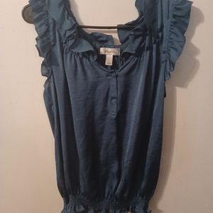 Turquoise blouse with ruffles